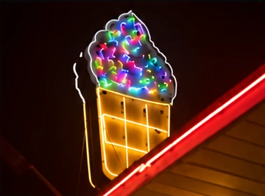 Colorful illuminated ice cream sign