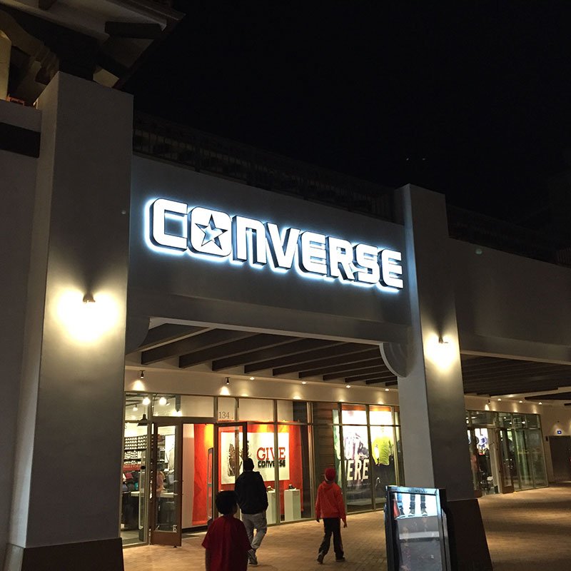 Illuminated Converse storefront sign